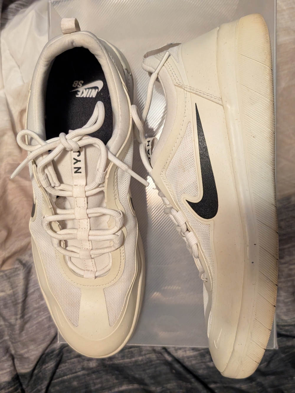 Nike Men’s White Sneakers with Black Swoosh
